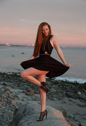 18 year old girl Agnes uncovers her perky tits as she gets completely naked